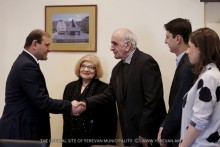 Yerevan Mayor Taron Margaryan handed the keys to new flats to Artavazd Peleshyan and to Narek Hakhnazaryan